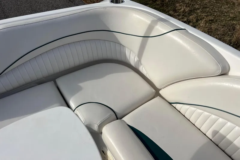 Slide: The Image of 2006 Hurricane FunDeck GS 194 OB boat interior with white cushioned seating. - 41