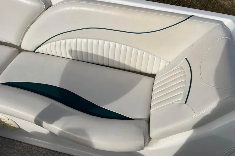 Slide: The Image of White and teal seating on a 2006 Hurricane FunDeck GS 194 OB boat. - 42