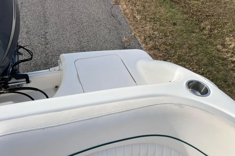 Slide: The Image of 2006 Hurricane FunDeck GS 194 OB boat interior with cup holder and seating. - 55