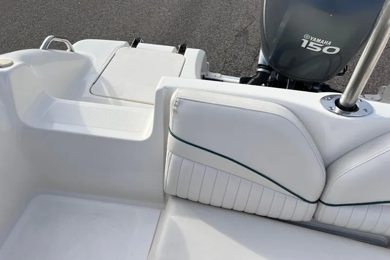 Slide: The Image of 2006 Hurricane FunDeck GS 194 OB boat interior with Yamaha 150 engine. - 56