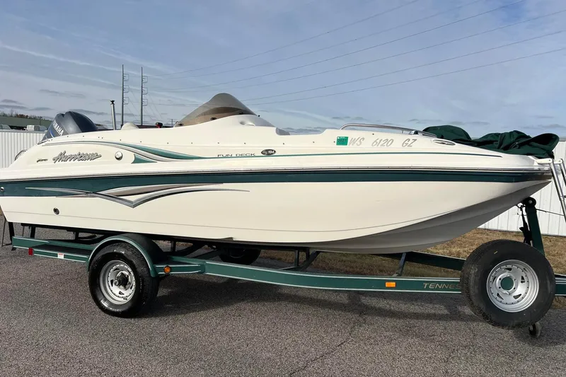 Slide: The Image of 2006 Hurricane FunDeck GS 194 OB boat on trailer, side view. - 63