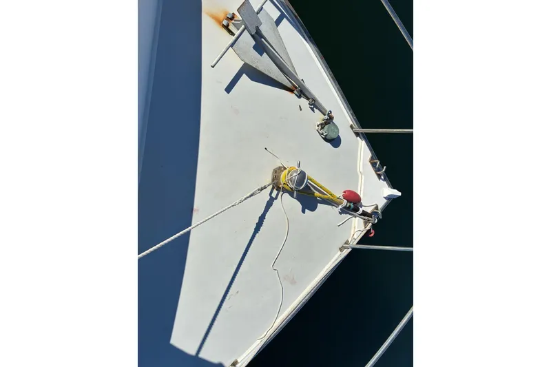 Slide: The Image of Bow of 2000 Calvin Beal COI PASSENGER boat with anchor and ropes. - 11