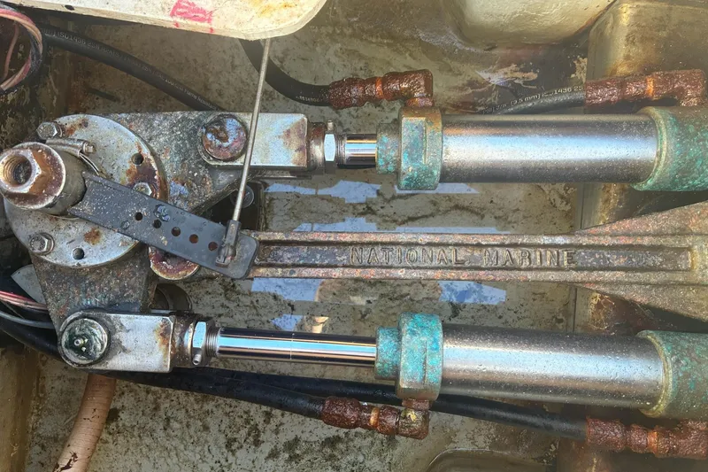 Slide: The Image of Rusty mechanical components of a 2000 Calvin Beal COI PASSENGER boat, featuring National Marine parts. - 18