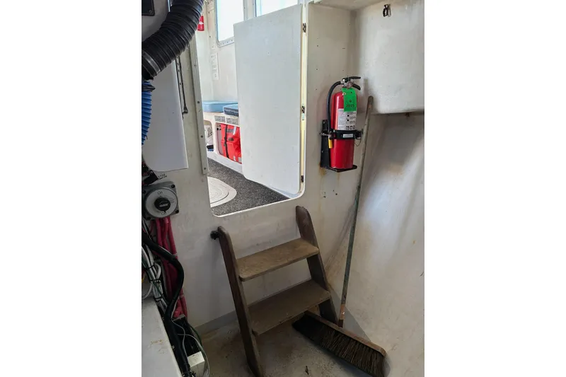 Slide: The Image of Interior of 2000 Calvin Beal COI Passenger boat with stairs and fire extinguisher. - 36
