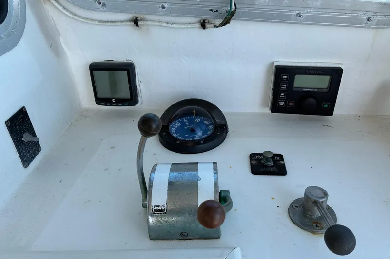 Slide: The Image of Control panel of a 2000 Calvin Beal COI PASSENGER boat with navigation instruments. - 58