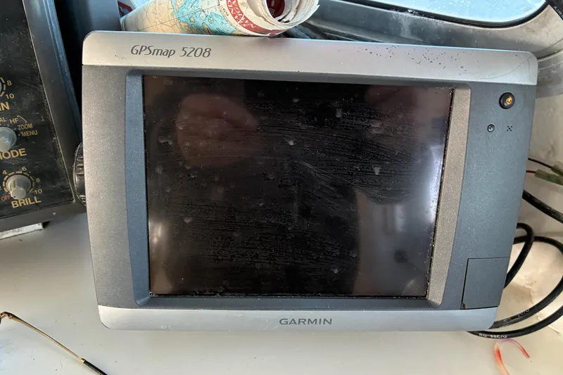 Slide: The Image of Garmin GPSmap 5208 on a 2000 Calvin Beal COI PASSENGER boat dashboard. - 66