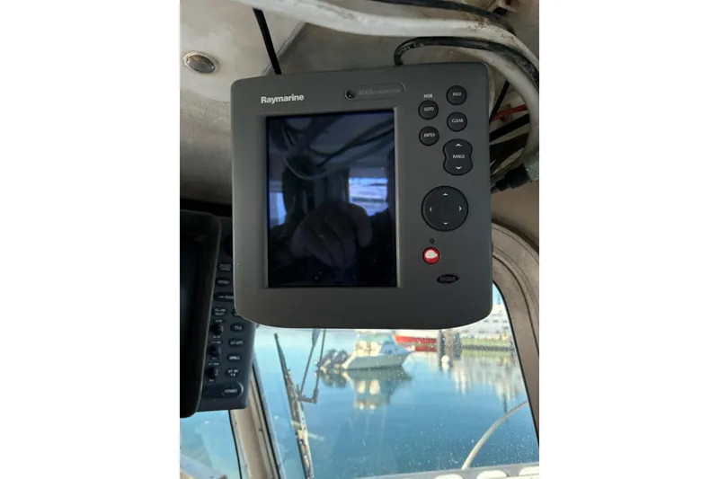 Slide: The Image of Raymarine navigation display on 2000 Calvin Beal COI PASSENGER boat, showing harbor reflection. - 67