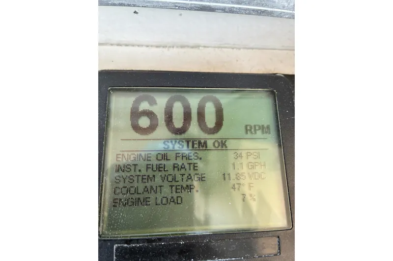 Slide: The Image of Display screen showing engine metrics: 600 RPM, 34 PSI oil pressure, 1.1 GPH fuel rate. - 70