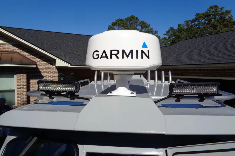 Slide: The Image of 2022 Hewes 210 Searunner ET Hardtop with Garmin radar and LED lights on roof. - 19