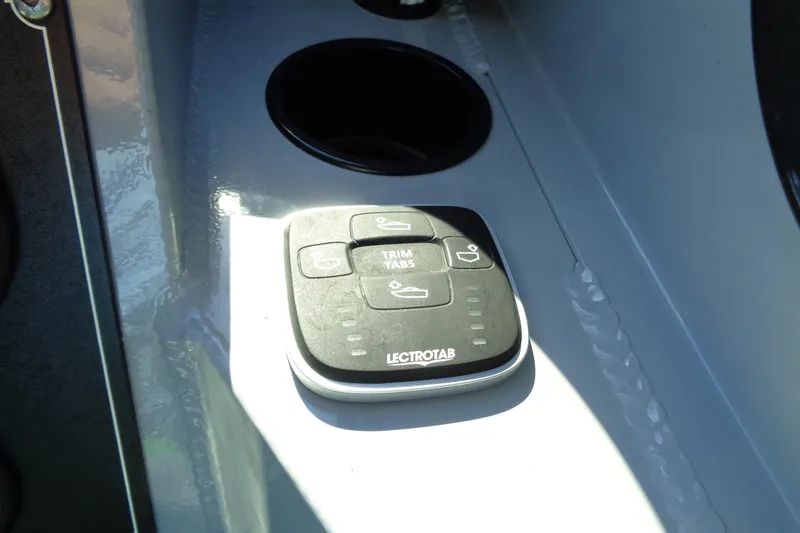 Slide: The Image of Control panel of 2022 Hewes 210 Searunner ET Hartop boat with Lectrotab trim tabs. - 9