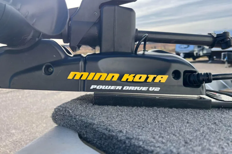 Slide: The Image of 2023 Lund SSV-14 Tiller trailer wheel on asphalt surface. - 16