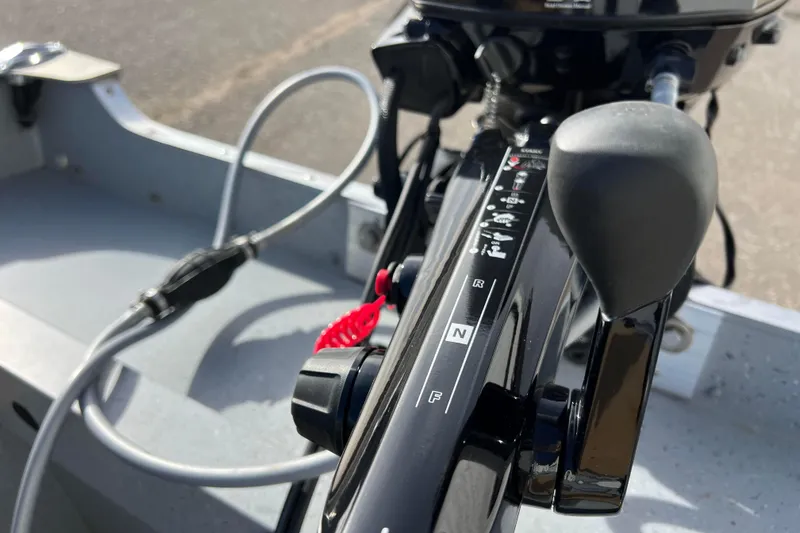 Slide: The Image of 2023 Lund SSV-14 Tiller boat interior with seat and navigation equipment. - 23