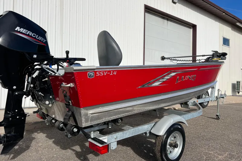 Slide: The Image of Close-up of a 2023 Lund SSV-14 Tiller tachometer showing 12.5 volts and 0.4 hours. - 4