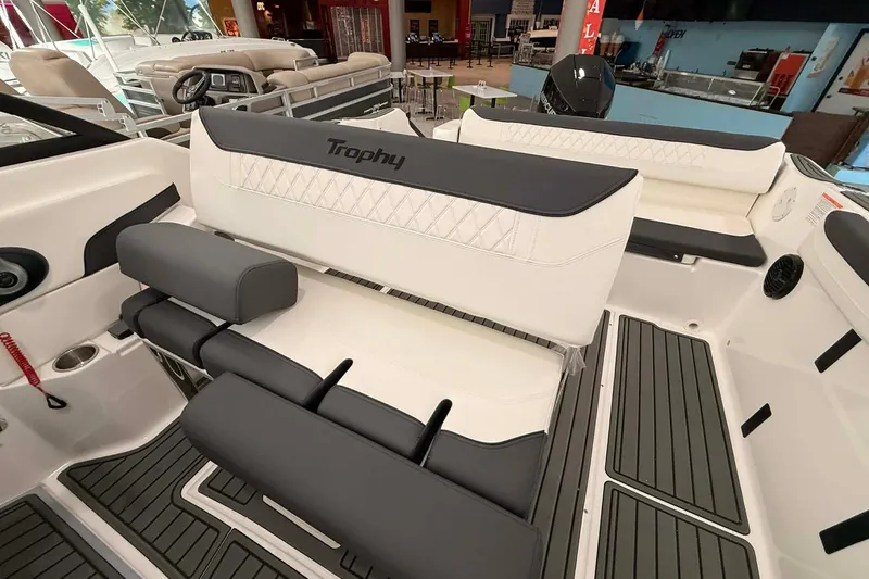 Slide: The Image of 2026 Bayliner Trophy T22SC boat interior with cushioned seating and modern design. - 4