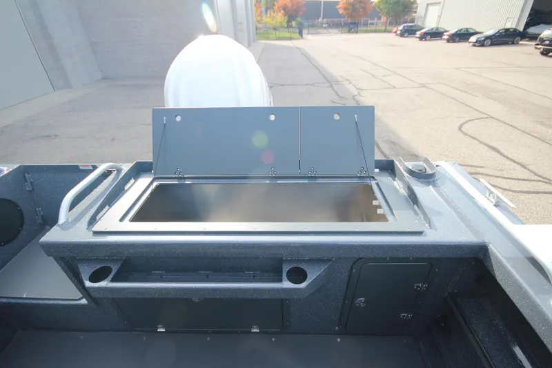 Slide: The Image of Interior of 2026 Weldcraft 260 Ocean King "Great Lakes Edition" boat, featuring modern seating and controls. - 14