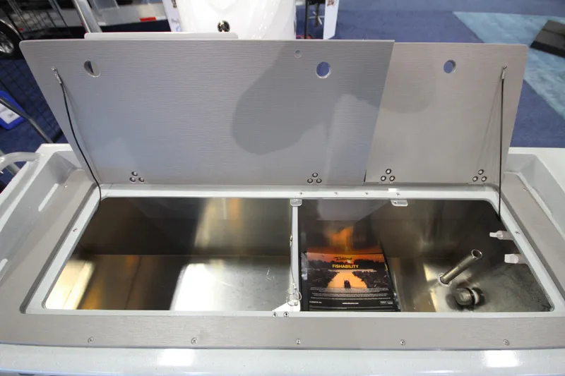 Slide: The Image of Open storage compartment on 2026 Weldcraft 260 Ocean King boat, showcasing interior features. - 39