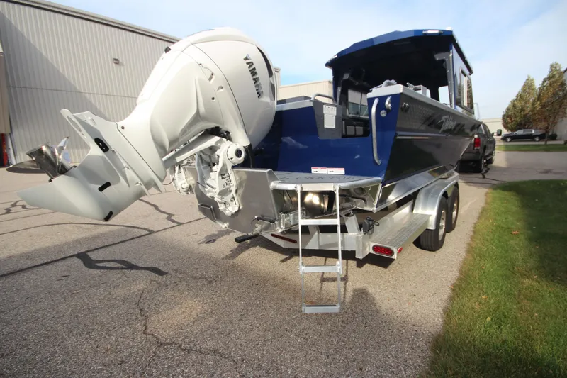 Slide: The Image of 2026 Weldcraft 260 Ocean King boat displayed indoors on a trailer. - 8