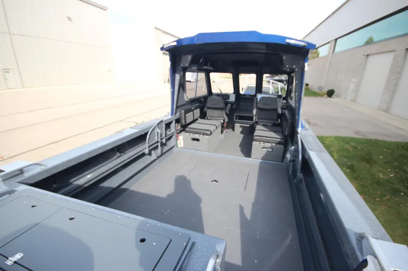 Slide: The Image of 2026 Weldcraft 260 Ocean King boat with F350XSB engine displayed indoors. - 10