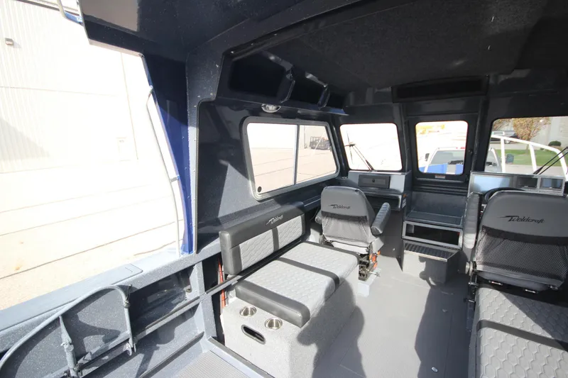 Slide: The Image of 2026 Weldcraft 260 Ocean King boat dashboard with advanced navigation and control systems. - 20