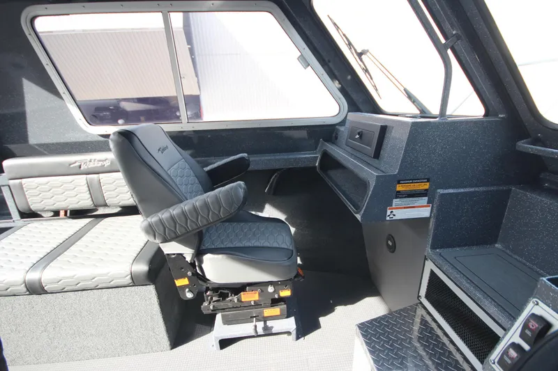 Slide: The Image of Interior view of 2026 Weldcraft 260 Ocean King boat dashboard at a boat show. - 24