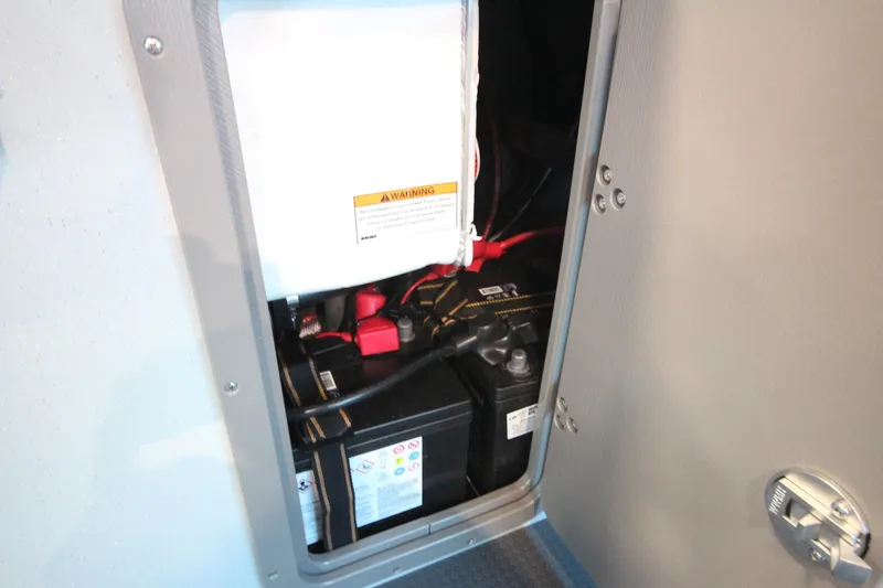 Slide: The Image of Battery compartment of 2026 Weldcraft 260 Ocean King "Great Lakes Edition" F350XSB boat. - 40