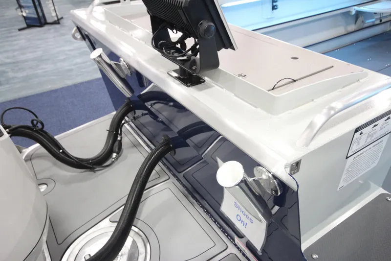 Slide: The Image of 2026 Weldcraft 260 Ocean King boat interior with control panel and wiring details. - 47