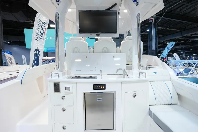 Slide: The Image of 2025 Regal 33 SAV yacht interior with modern amenities and sleek design. - 10