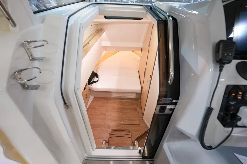 Slide: The Image of Interior cabin of 2025 Regal 33 SAV boat with modern amenities. - 15