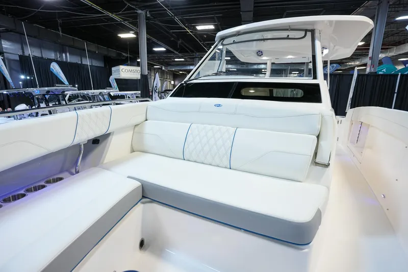Slide: The Image of 2025 Regal 33 SAV boat interior with luxurious white seating and modern design. - 18
