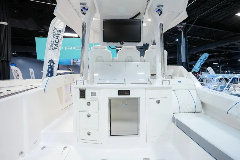 Slide: The Image of 2025 Regal 33 SAV boat interior with modern amenities and sleek design. - 6