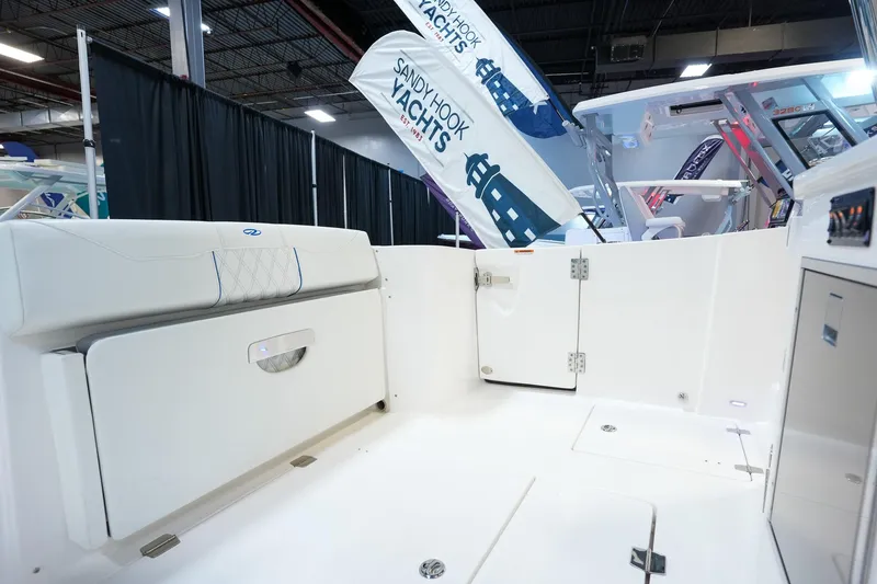 Slide: The Image of 2025 Regal 33 SAV yacht interior at Sandy Hook Yachts display. - 9