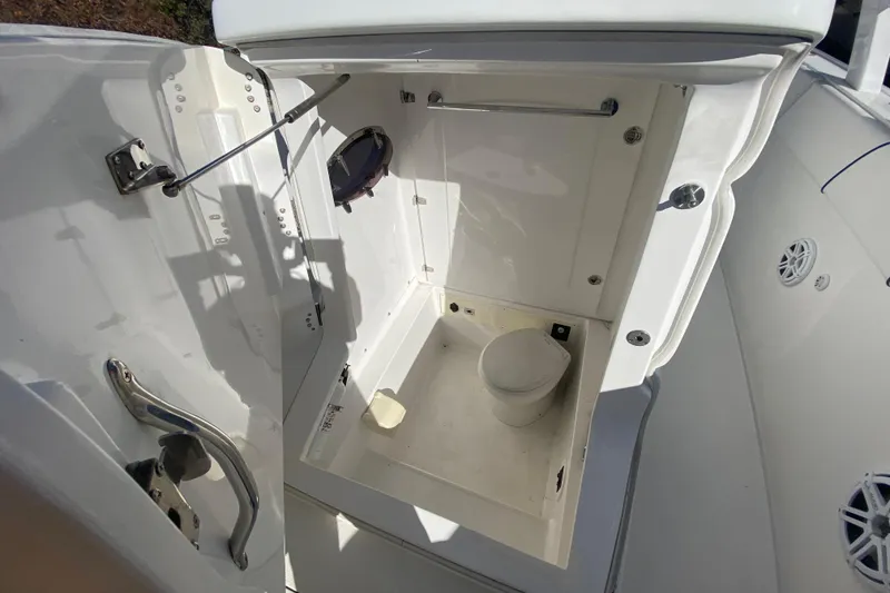 Slide: The Image of 2017 Midnight Express 39S Cuddy boat bathroom interior with toilet and hatch. - 20
