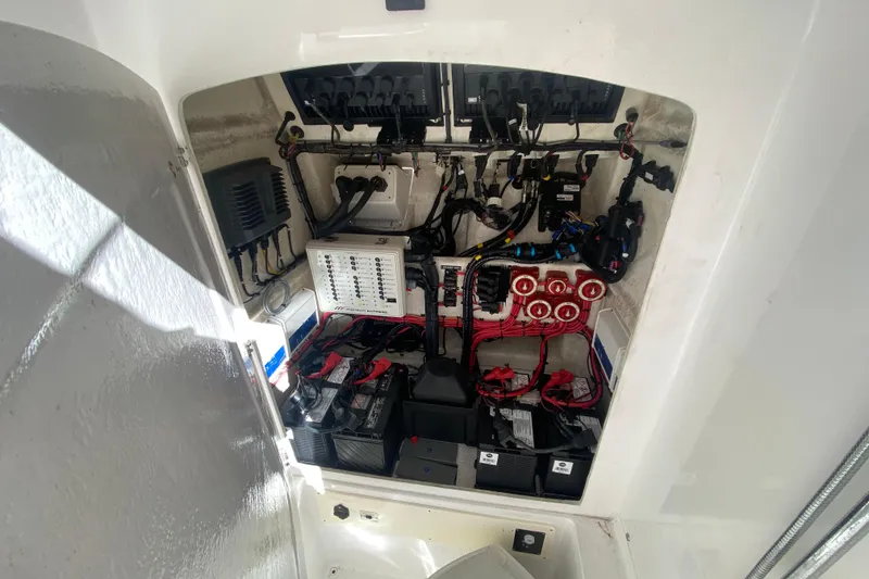 Slide: The Image of Electrical system inside a 2017 Midnight Express 39S Cuddy boat, showcasing wiring and components. - 21