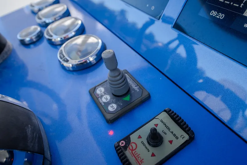 Slide: The Image of Control panel of a 2017 Midnight Express 39S Cuddy boat with gauges and switches. - 30