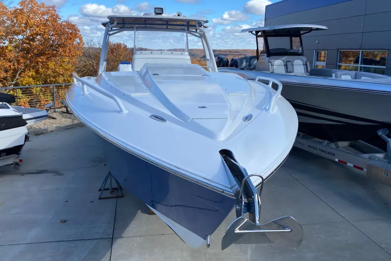 Slide: The Image of 2017 Midnight Express 39S Cuddy boat on display, featuring sleek design and modern amenities. - 6