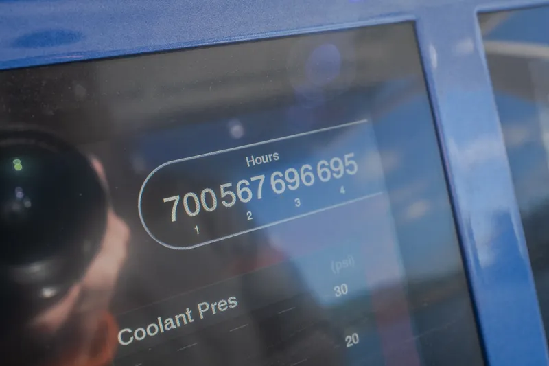 Slide: The Image of Close-up of a digital display on a 2017 Midnight Express 39S Cuddy boat. - 56