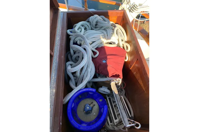 Slide: The Image of Storage compartment on 1981 Hardin 45 sailboat with ropes and sailing gear. - 10