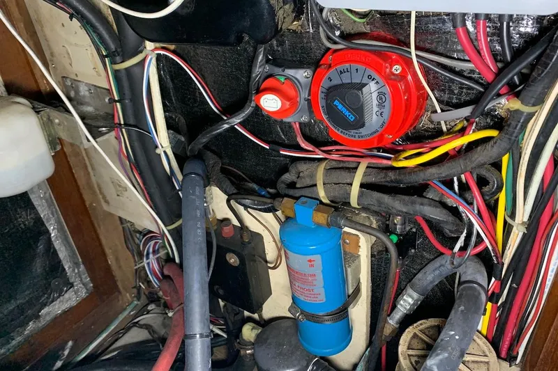 Slide: The Image of Electrical wiring and components inside a 1981 Hardin 45 boat. - 14