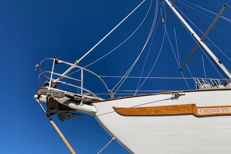 Slide: The Image of Bow of 1981 Hardin 45 sailboat against clear blue sky. - 2