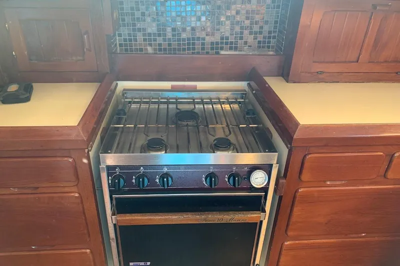 Slide: The Image of Vintage 1981 Hardin 45 stove in wooden kitchen setting. - 30