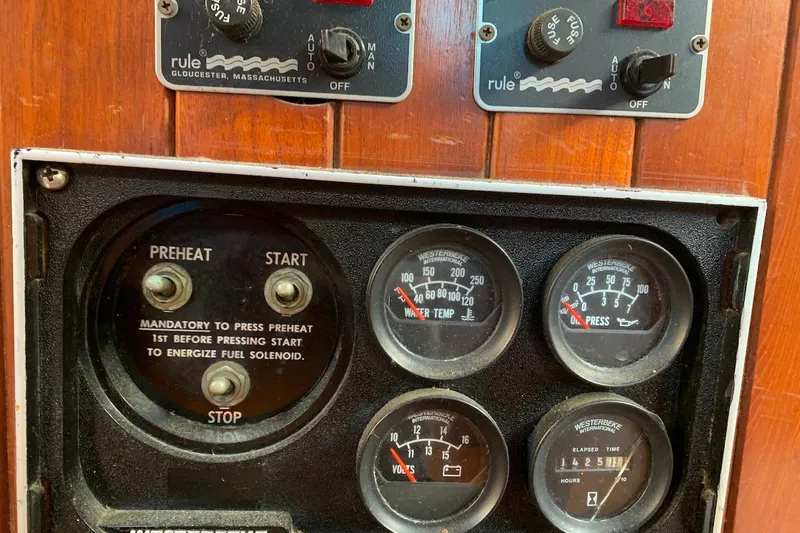 Slide: The Image of Control panel of a 1981 Hardin 45 boat with gauges and switches. - 40