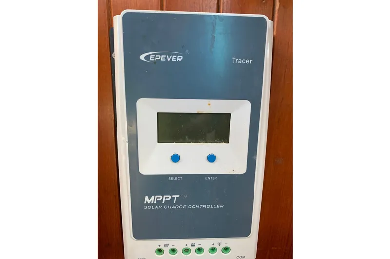 Slide: The Image of EPever MPPT solar charge controller on Hardin 45, 1981 model, mounted on wooden panel. - 41