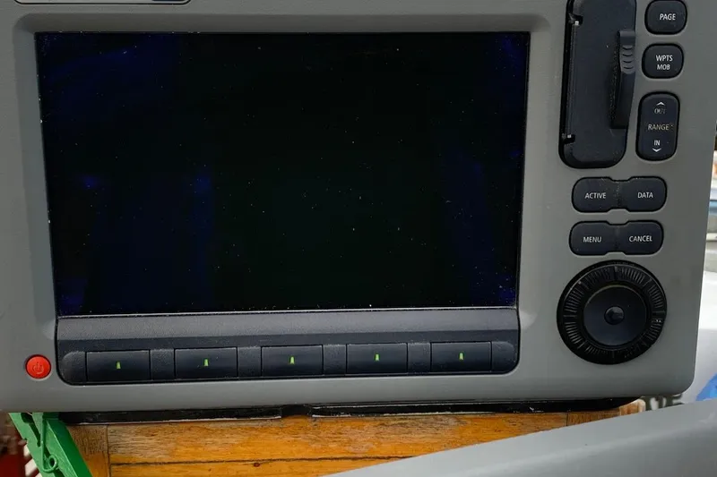 Slide: The Image of Control panel of a Hardin 45, 1981 model, featuring buttons and a display screen. - 43