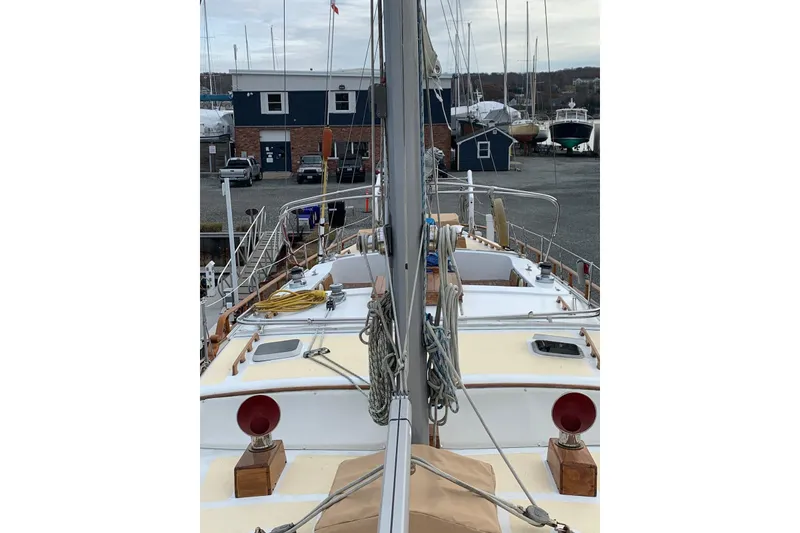 Slide: The Image of 1981 Hardin 45 sailboat docked at marina, view from deck, overcast sky. - 44