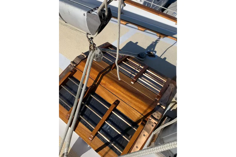 Slide: The Image of Wooden hatch and rigging on a 1981 Hardin 45 sailboat deck. - 5