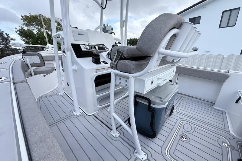 Slide: The Image of 2024 Sea Pro 222 Center Console boat interior with seating and console features. - 12