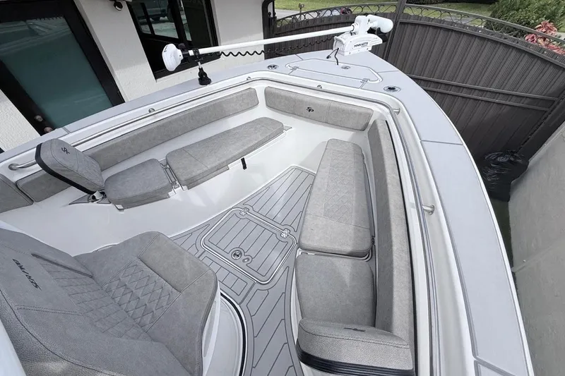 Slide: The Image of 2024 Sea Pro 222 Center Console boat with spacious seating and modern design. - 23