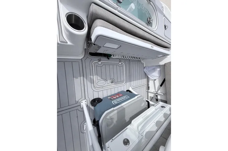 Slide: The Image of 2024 Sea Pro 222 Center Console interior with cooler and seating. - 24