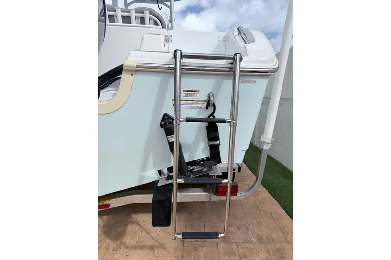 Slide: The Image of 2024 Sea Pro 222 Center Console boat with stainless steel boarding ladder. - 26