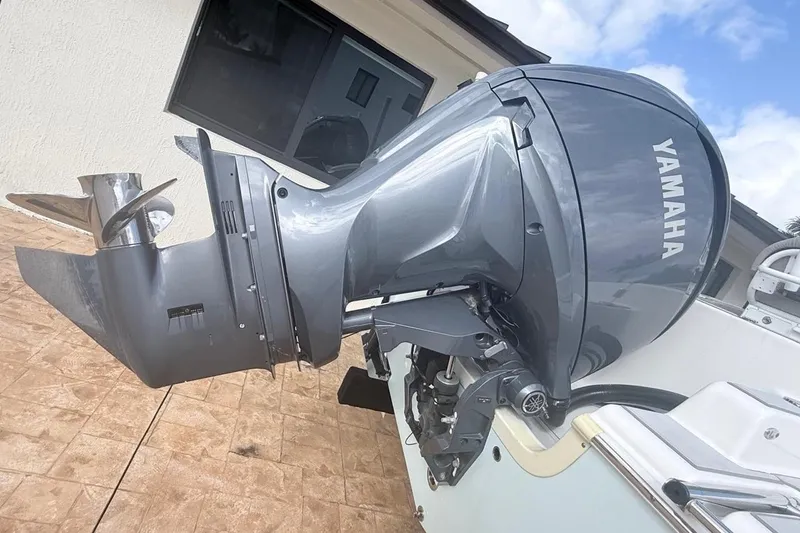 Slide: The Image of 2024 Sea Pro 222 Center Console with Yamaha outboard motor, side view. - 28